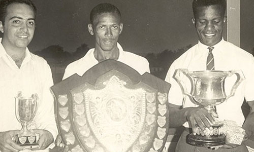 Len Harris holding the shield Len Harris holding the shield